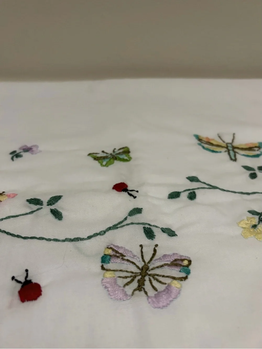 Vintage Embroidered White Standard Pillowcases Butterflies In Flight by Bucilla